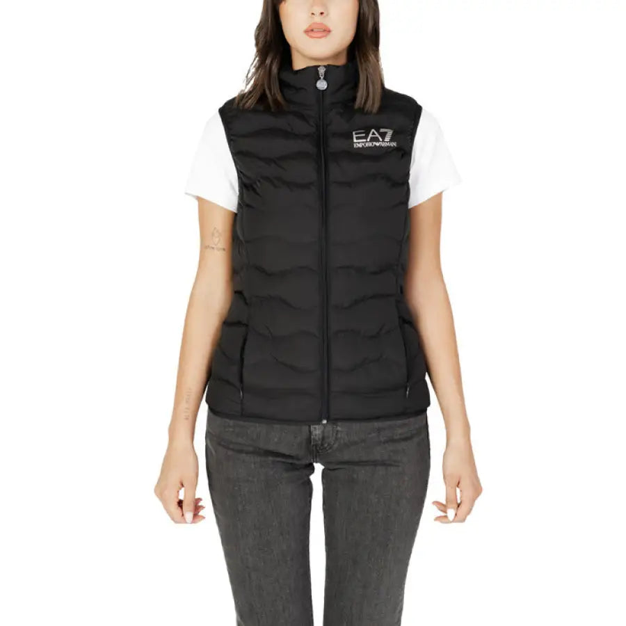 Black quilted EA7 vest over a white t-shirt from EA7 Women’s Gilet collection