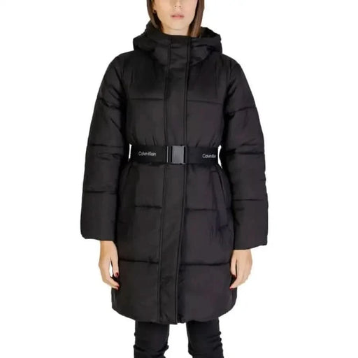 Black quilted winter parka with hood and belted waist by Calvin Klein Jeans for women