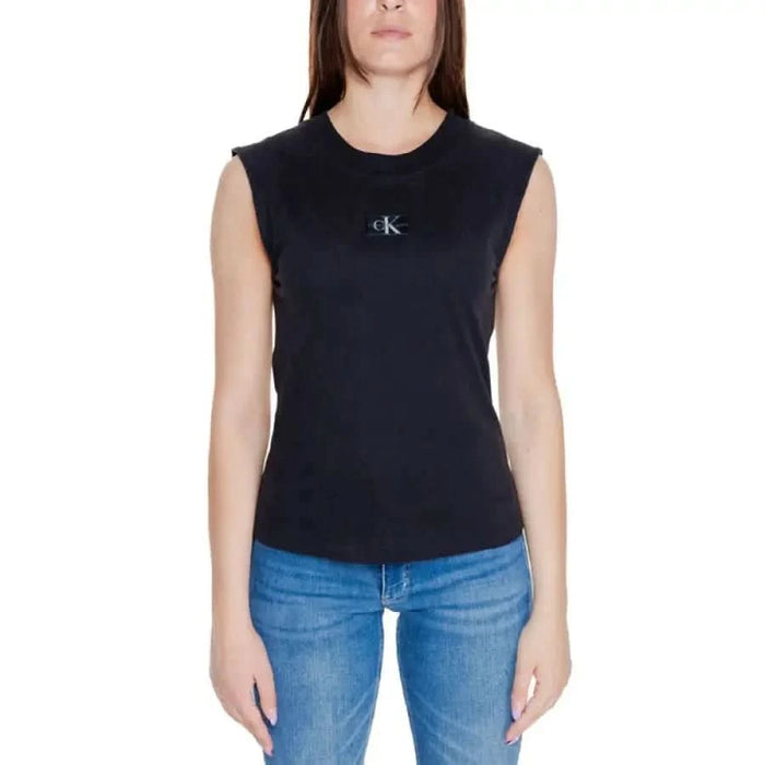 Black ’CK’ top & blue jeans from Calvin Klein Jeans Women’s T-Shirt collection