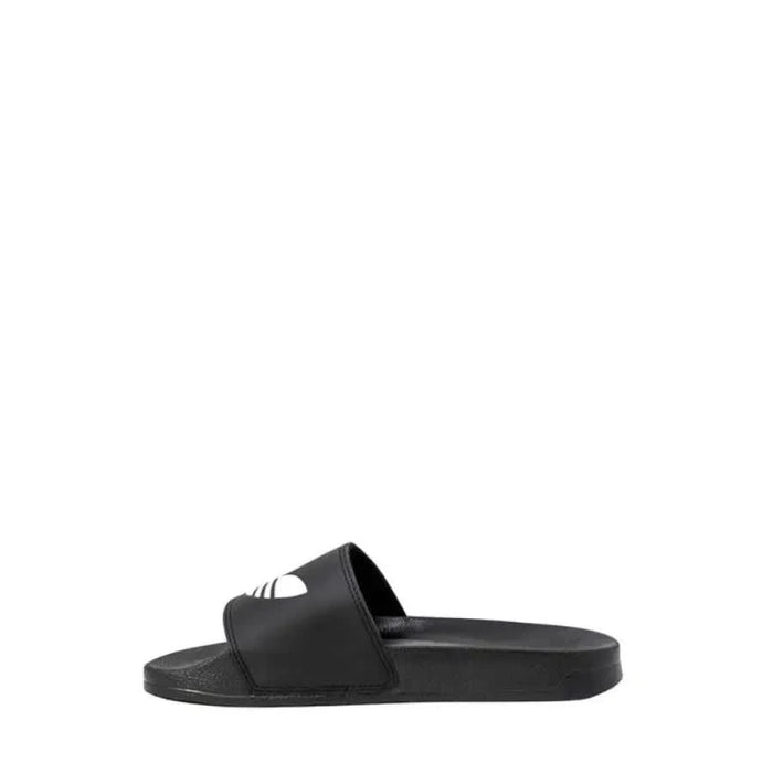 Black slide sandal featuring white Adidas logo on strap for men’s comfort