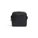 Black square crossbody bag with zipper compartments and logo patch by Calvin Klein