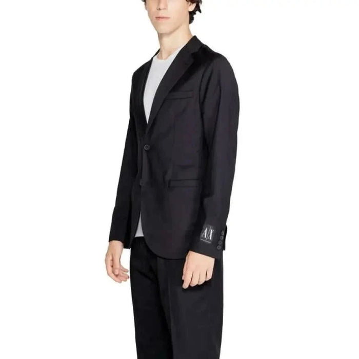 Black suit jacket over light gray t-shirt from Armani Exchange Men Blazer