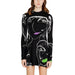 Black sweater dress by Desigual featuring white abstract faces and colorful accents