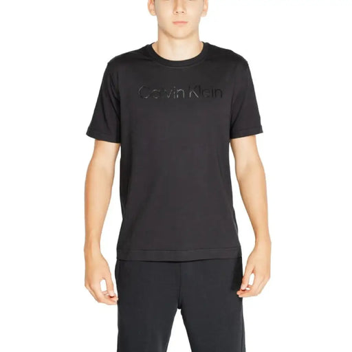 Black Calvin Klein Sport t-shirt with embossed Calvin Klein text on the chest