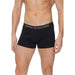 Black Tommy Hilfiger boxer briefs on a male torso in Tommy Hilfiger Men Underwear product