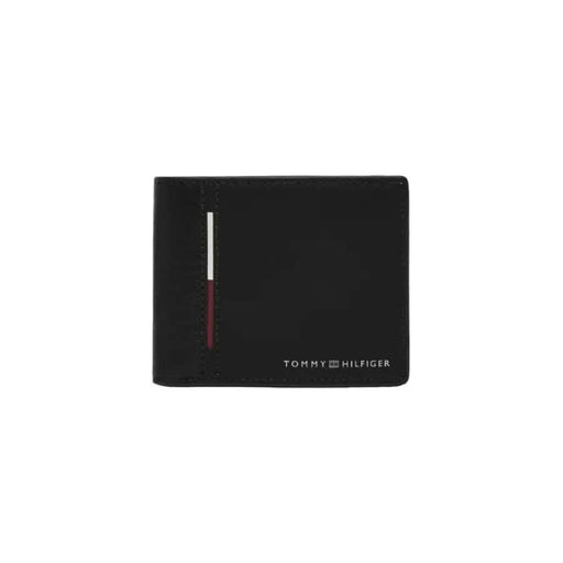 Black Tommy Hilfiger wallet featuring vertical red and white stripe detail