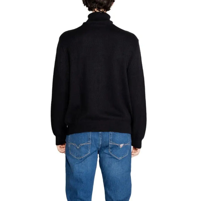 Black turtleneck sweater from behind, featured in Armani Exchange Men’s collection