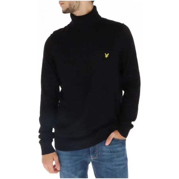 Black turtleneck sweater featuring yellow logo emblem from Lyle & Scott Men Knitwear