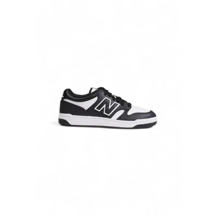 Black and white New Balance Men Sneakers featuring a distinctive N logo on the side