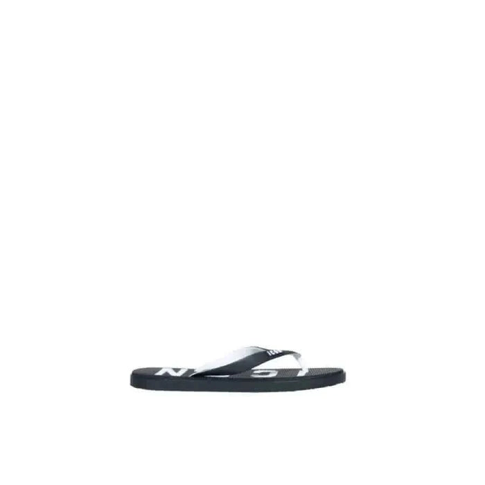 Black and white Icon Men Slippers featuring logo on strap, stylish and comfortable footwear