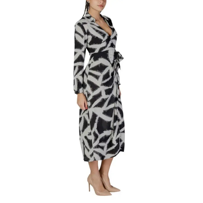 Black and white patterned Jacqueline De Yong midi wrap dress with long sleeves