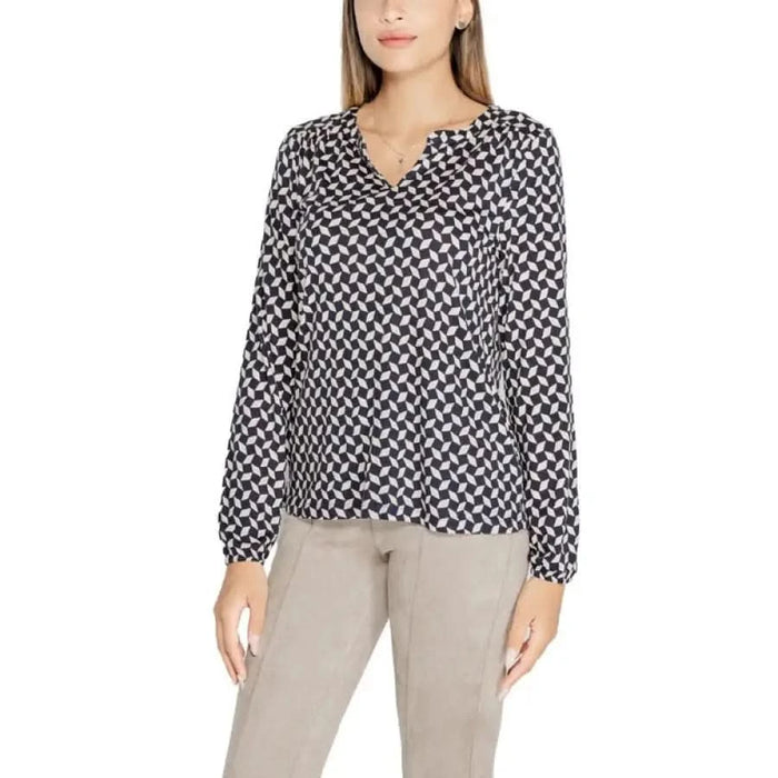 Black and white patterned blouse with long sleeves and v-neck collar by Street One