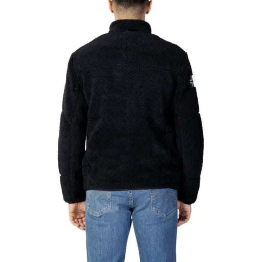 Black zip-up fleece jacket with a high collar, perfect for Men’s apparel & accessories