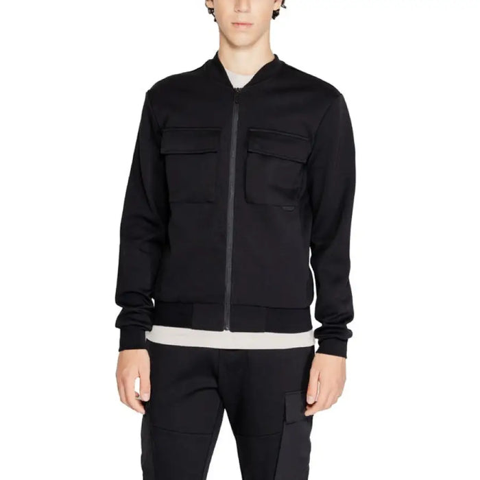 Black zip-up Antony Morato men sweatshirt featuring chest pockets and ribbed cuffs