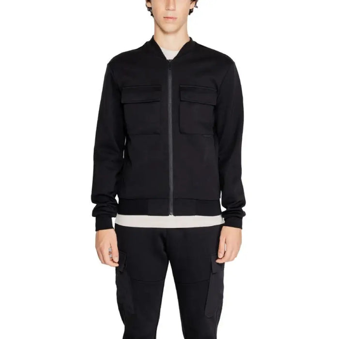 Black zip-up Antony Morato men sweatshirt featuring two chest pockets for style and utility