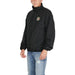 Black zip-up jacket by Tommy Hilfiger featuring embroidered logo on chest