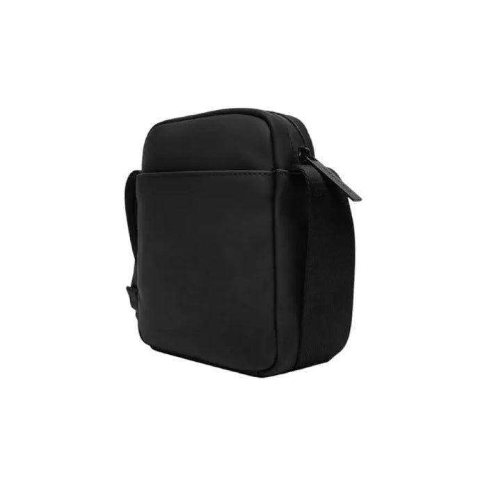 Calvin Klein Men’s Black Shoulder Bag featuring a compact square shape with zippered closure