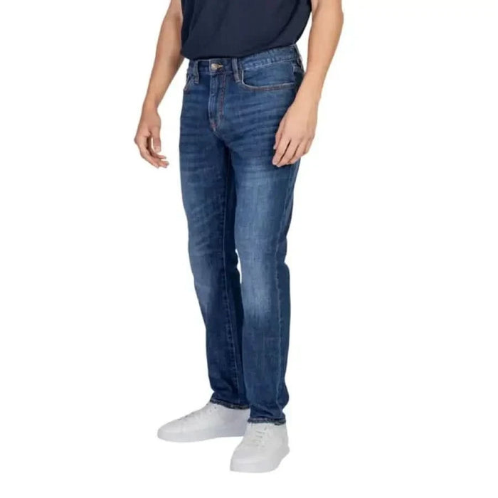 Blue denim jeans worn by a person showcasing Armani Exchange Men Trousers