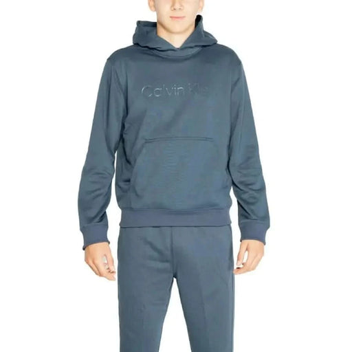 Blue Calvin Klein Sport sweatshirt featuring embossed branding on the chest