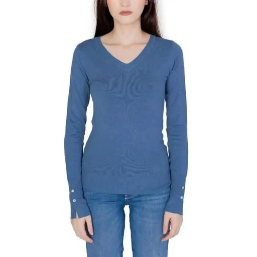 Guess Women Knitwear: Blue long-sleeved V-neck sweater styled with jeans