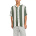 Boy in Jack & Jones green and white men shirt