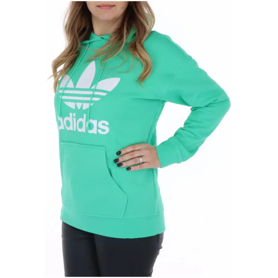 Bright green Adidas hoodie with white logo and front pocket from Adidas Women Sweatshirts