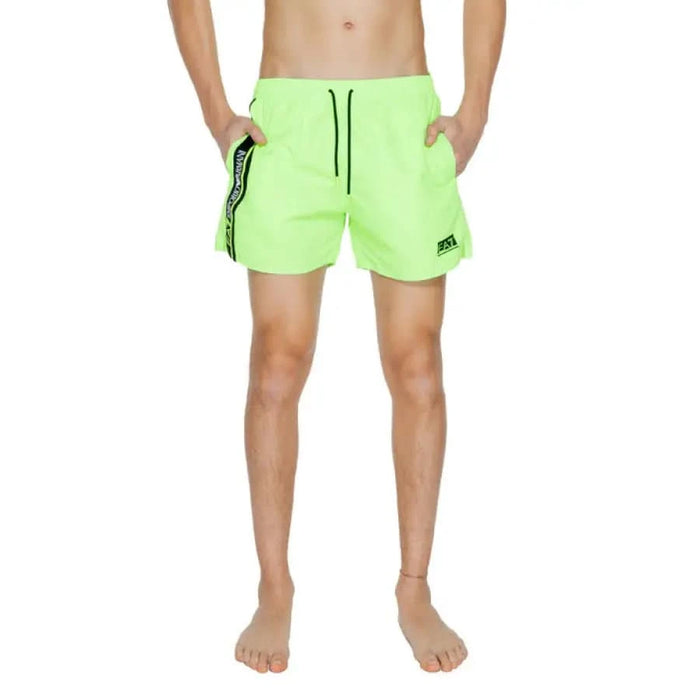 Bright neon green swim shorts with black drawstring and side stripe from Ea7 Men Swimwear