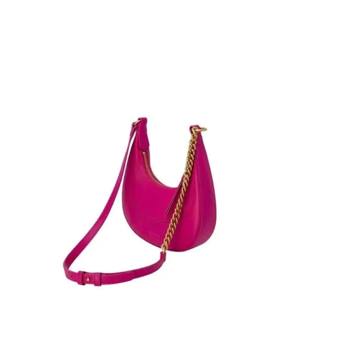 Bright pink crescent-shaped handbag by Pinko with gold chain and adjustable strap