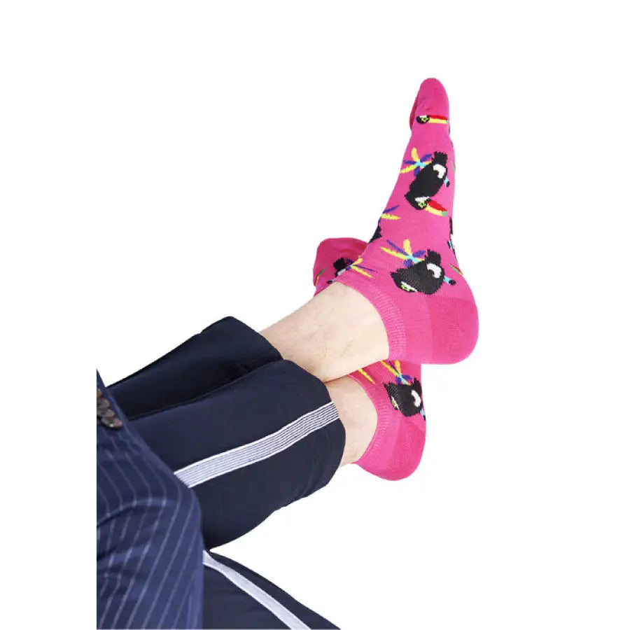 Bright pink sock with a black bomb and yellow star pattern from Happy Socks Women Underwear