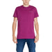 Bright purple Tommy Jeans t-shirt worn by a person in blue jeans.