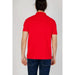 Bright red polo shirt worn by a person for Emporio Armani Men Polo product display