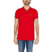 Bright red Tommy Hilfiger men’s polo shirt featuring a small logo on the chest