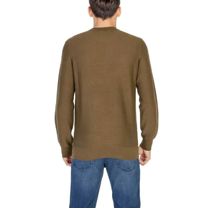 Brown knit sweater displayed from the back in Boss Men Knitwear collection