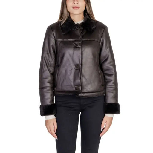 Brown leather jacket with black fur trim and button closures by Jacqueline De Yong