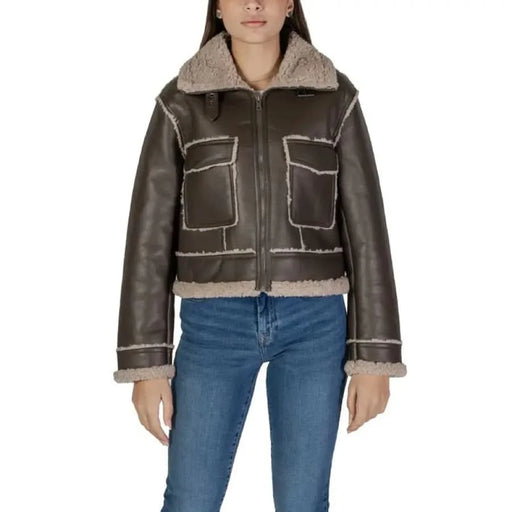 Brown leather shearling jacket with contrast stitching and front pockets by Only