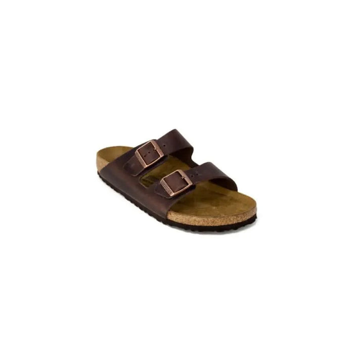 Brown leather Birkenstock sandals with buckle straps and cork footbed for women