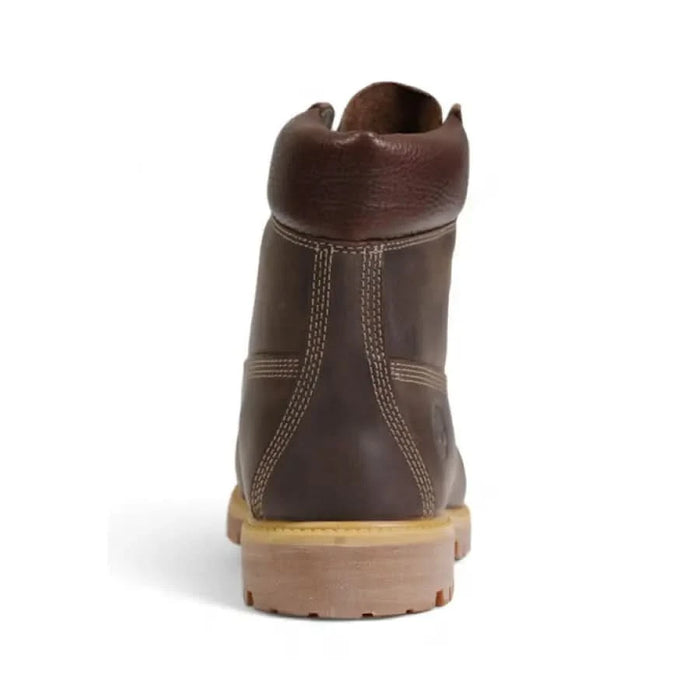 Brown leather Timberland Men Boots featuring thick rubber sole and visible stitching