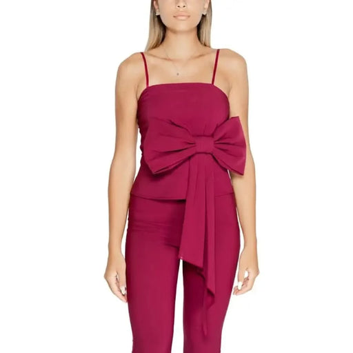 Burgundy sleeveless jumpsuit with dramatic bow detail at the waist from Rinascimento