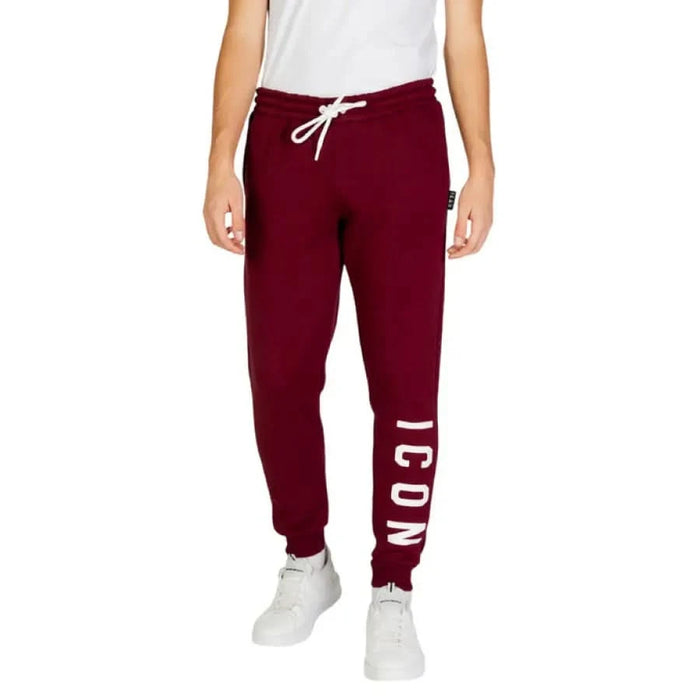 Burgundy sweatpants with ICON text on leg and drawstring waist for stylish men