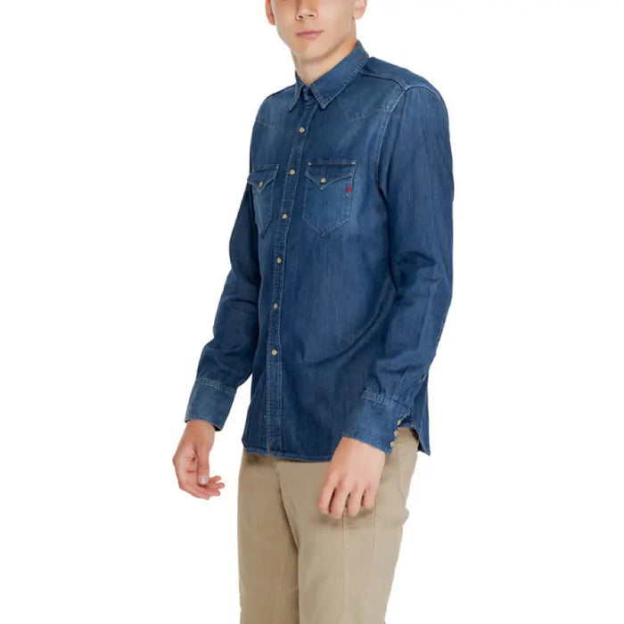 Classic blue denim button-up shirt with long sleeves and chest pockets by Replay