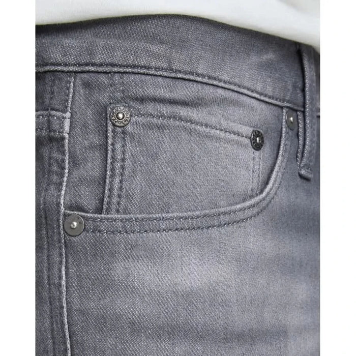 Close-up of gray denim jeans pocket with stitching and rivets, Jack & Jones Men Shorts