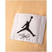 Urban style Jordan men T-shirt with close-up of white and black Jordan logo on white cloth