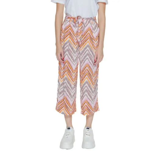 Colorful chevron-patterned cropped pants with a white top and sneakers, Only Women Trousers