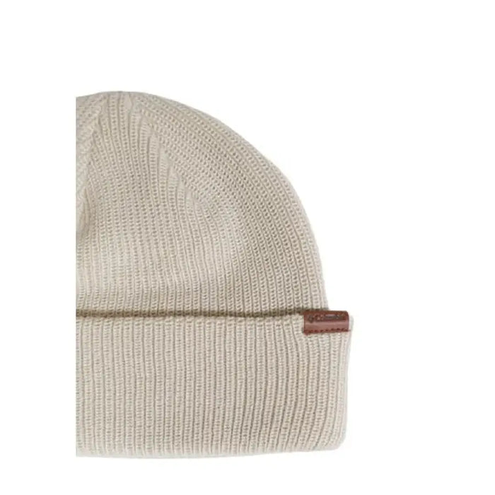 Cream-colored knit beanie featuring a small brown leather tag from Columbia Men Cap