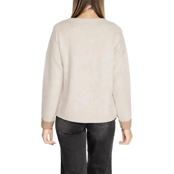 Cream-colored long-sleeved sweater from Street One worn by a person from behind