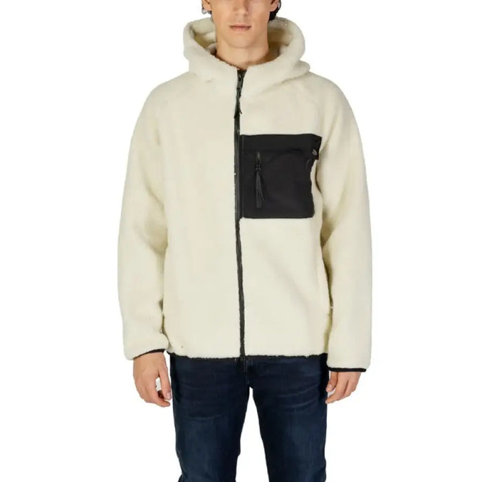 Cream-colored sherpa fleece jacket with black chest pocket and full zipper for men