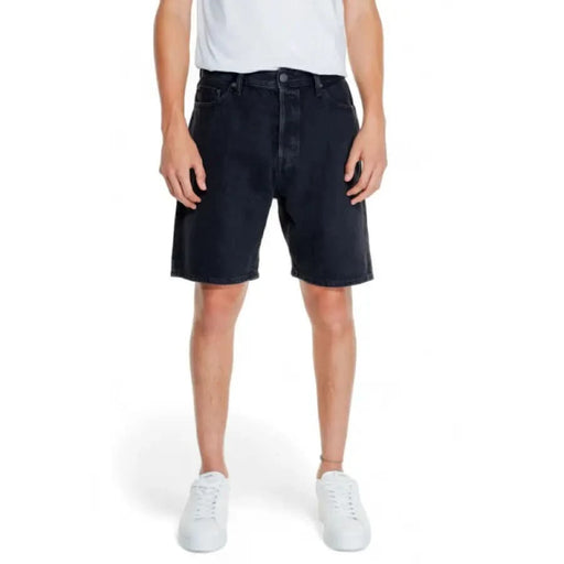 Jack & Jones stylish dark denim shorts worn with white t-shirt and sneakers for a trendy look