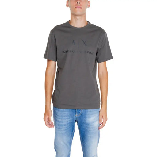 Dark gray Armani Exchange t-shirt with tonal logo paired with blue jeans