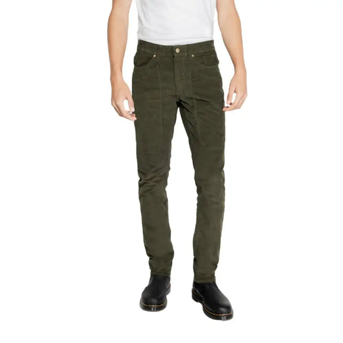 Dark green slim-fit Jeckerson Men Trousers paired with a white shirt on model