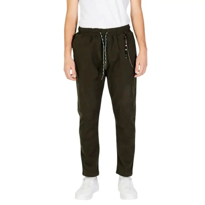 Dark olive green jogger pants with drawstring waist and side pockets by Gianni Lupo